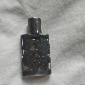 Silver Men's Grooming  Cologne Bottle.
